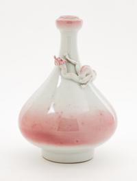 A Japanese White and Red Glazed Porcelain Bottle Vase Height 7 1/2 inches.