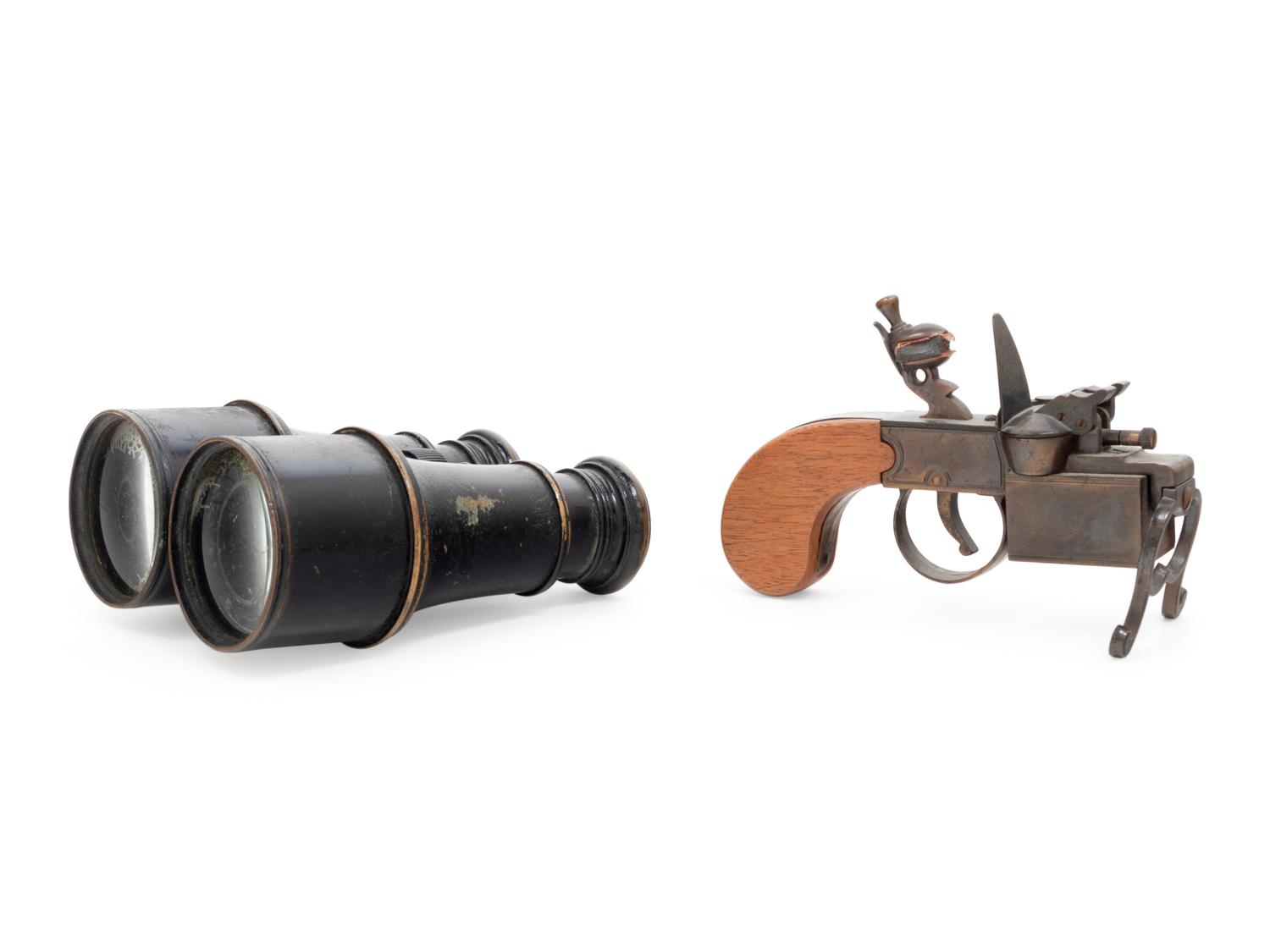 A Dunhill Pistol Form Lighter and a Lemaire Binoculars