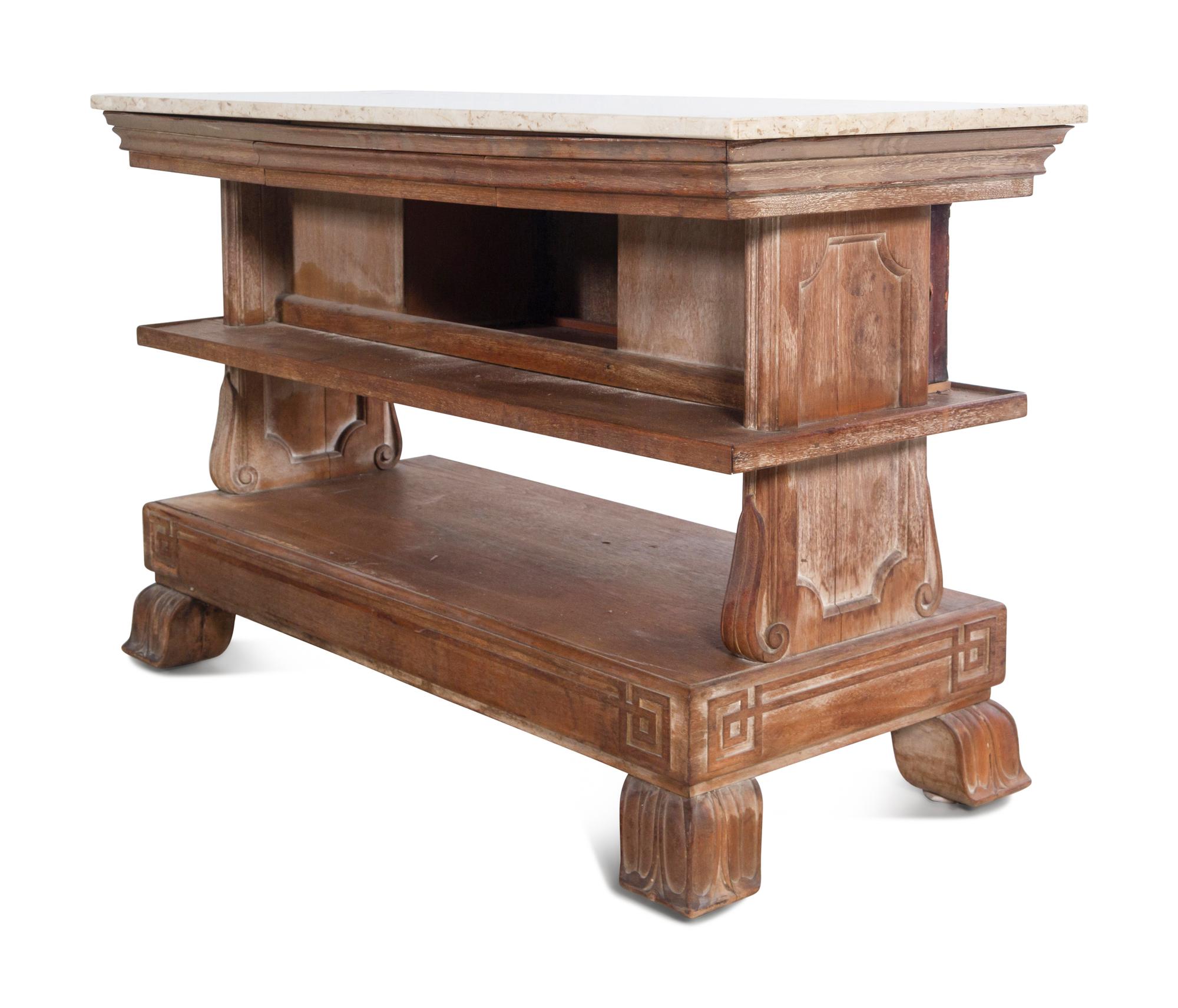 A Carved Marble-Top Console Table with Faux Books