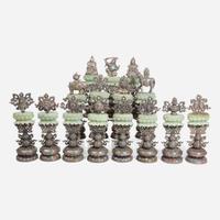 Fifteen Sino-Tibetan style embellished jade and silver alloy altar ornaments