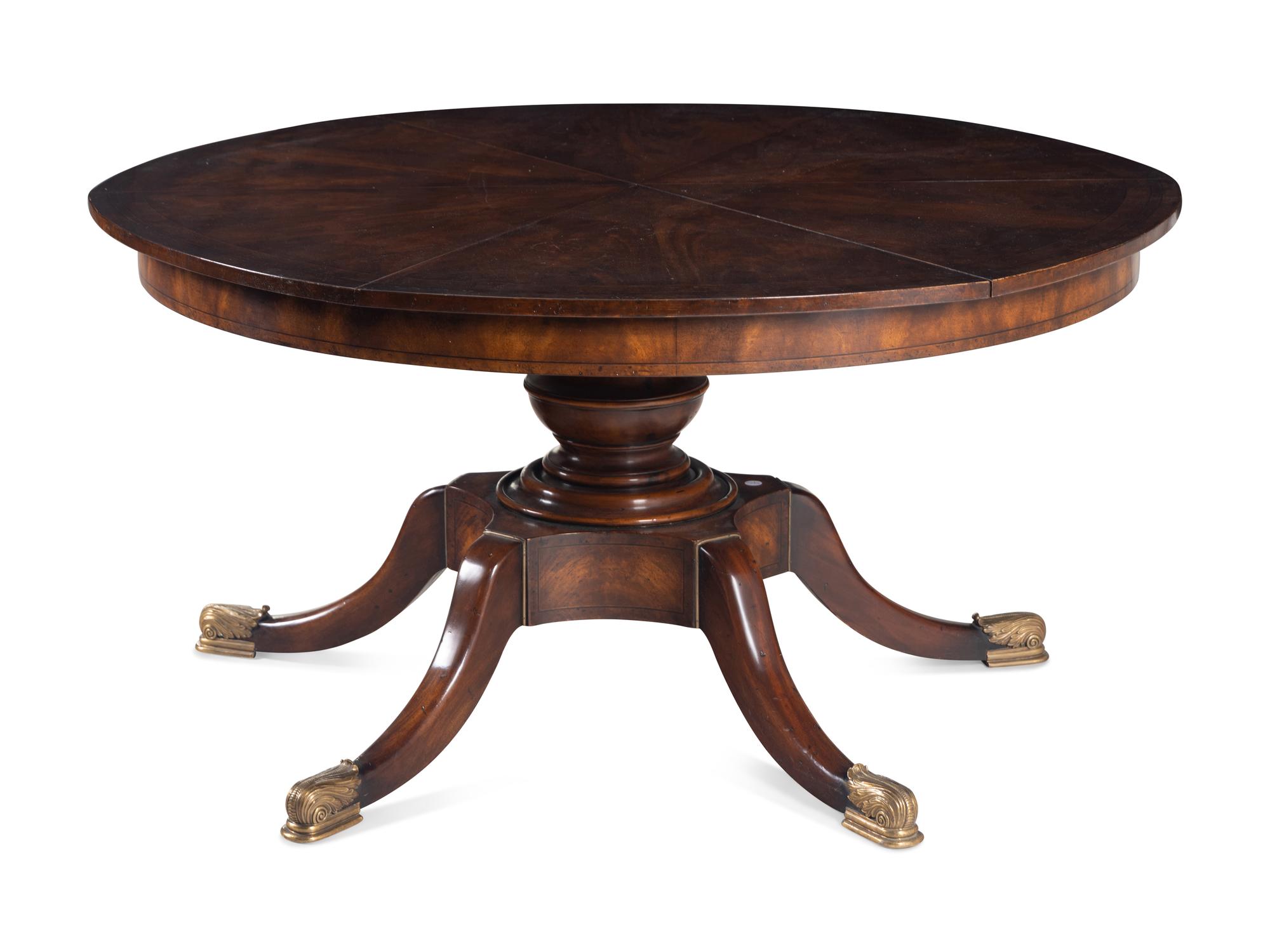 A Regency Style Rosewood and Burlwood Cross-Banded Mahogany Jupe Dining Table