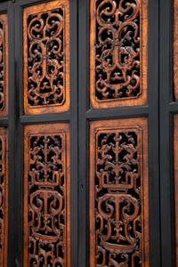 A Chinese Part-Ebonized Burlwood Cupboard