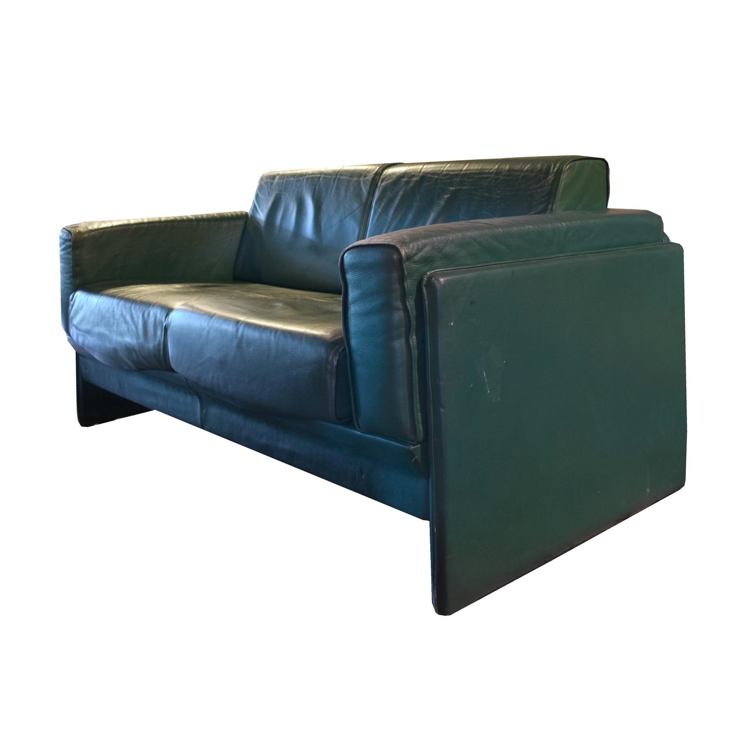 A Pair of Mid-Century Leather Sofas, from the Milan Airport 61" W x 35" D x 30" H — Italy, Mid-20th Century