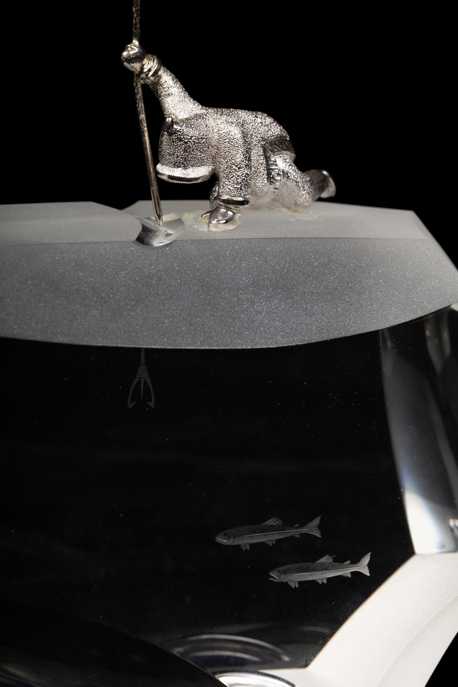 A Steuben Glass and Silver Arctic Fisherman Sculpture
