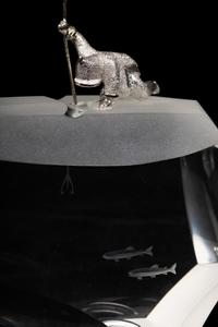 A Steuben Glass and Silver Arctic Fisherman Sculpture