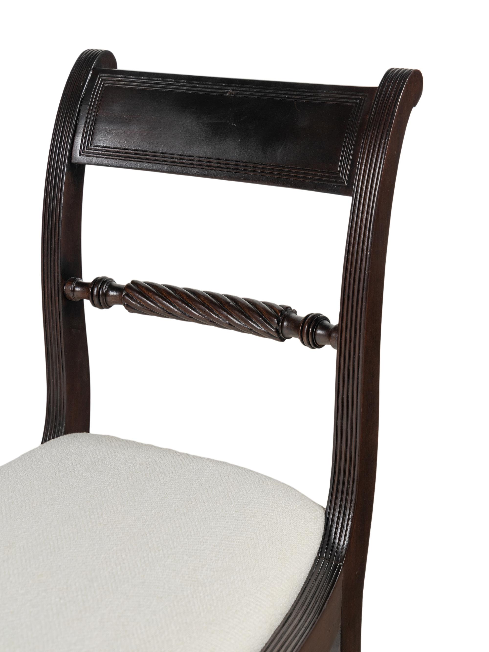 A Set of Four English Mahogany Dining Chairs