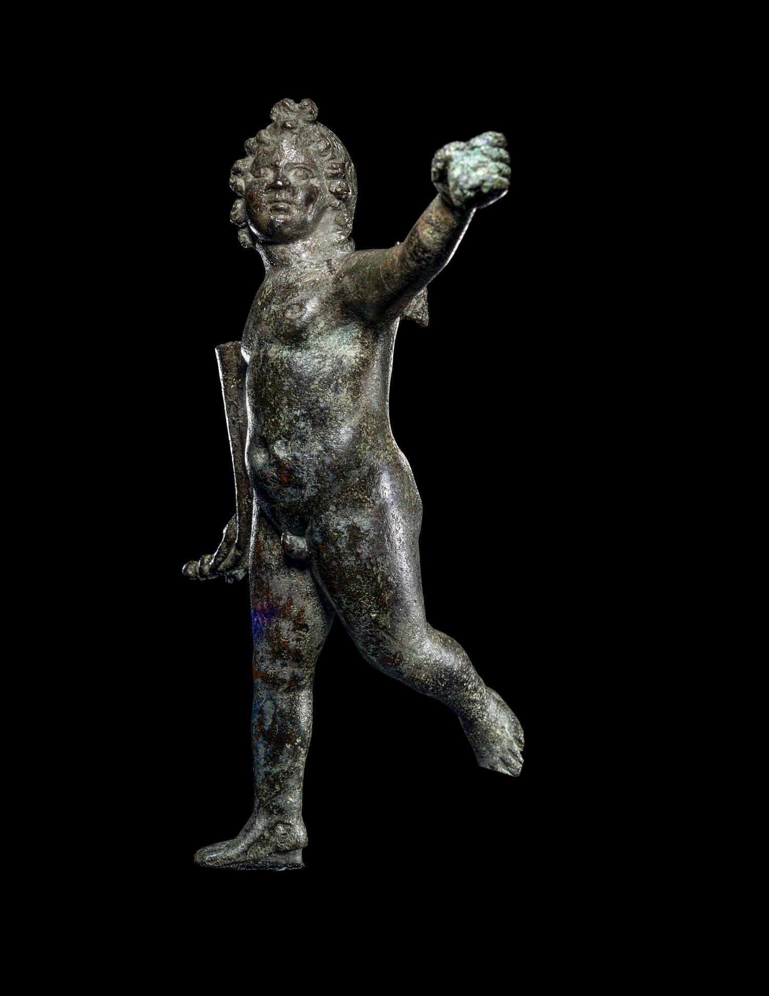 A Roman Bronze Nude Winged Eros