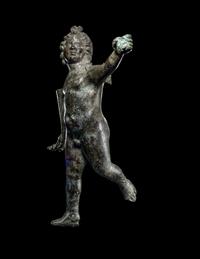 A Roman Bronze Nude Winged Eros