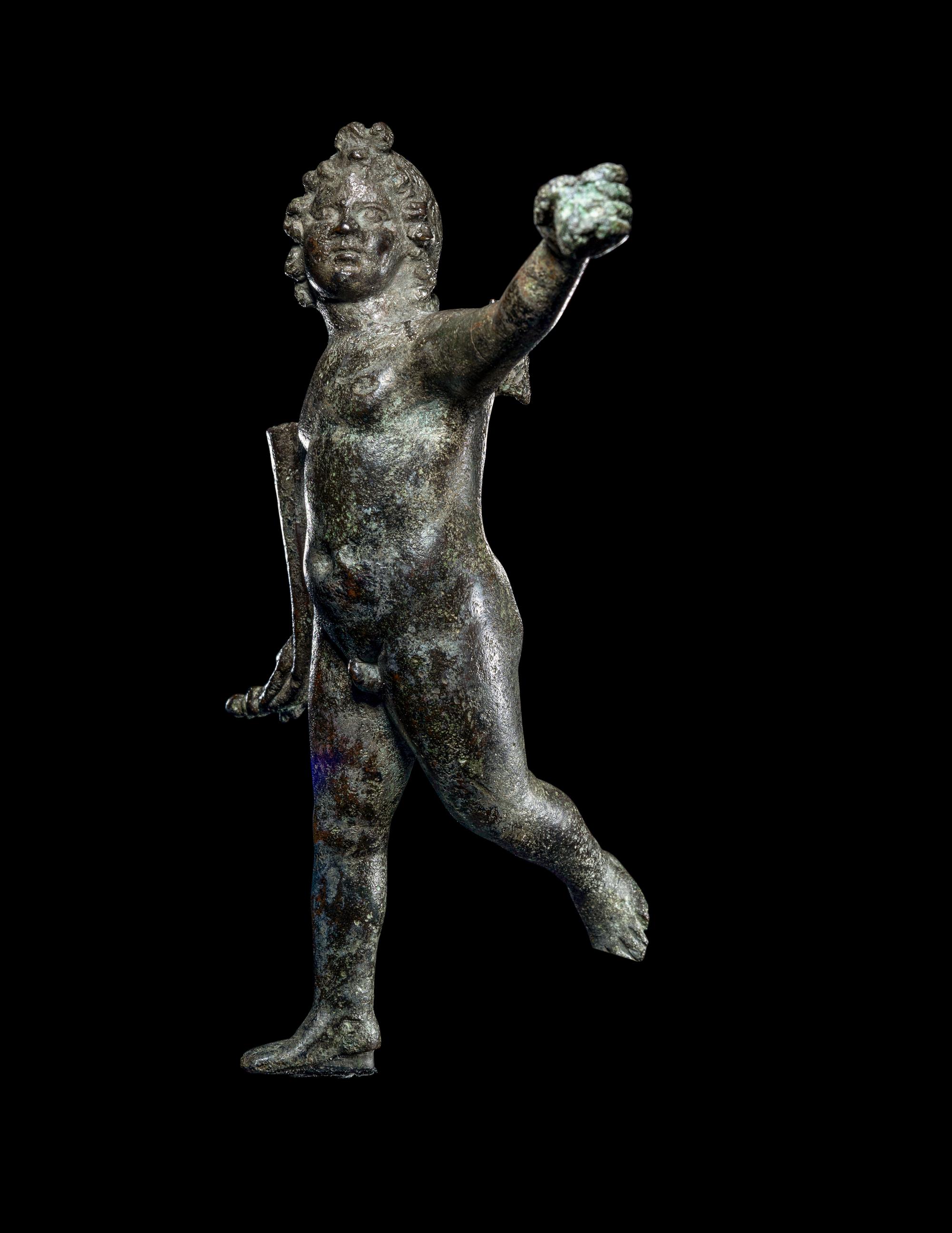 A Roman Bronze Nude Winged Eros