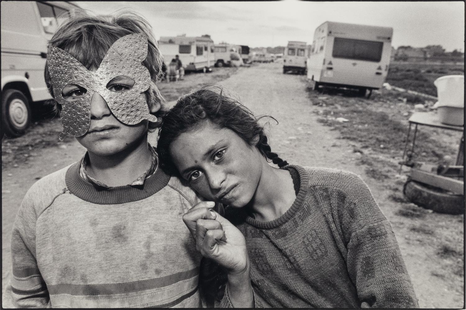 Mary Ellen Mark (1941-2015) Boy with Mask and His Sister, Gypsy Camp, Barcelona, 1987
