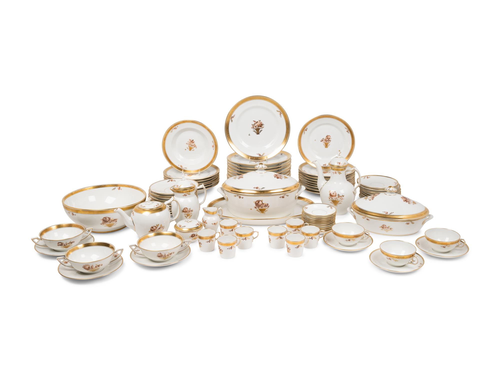 A Royal Copenhagen Golden Basket Porcelain Dinner Service