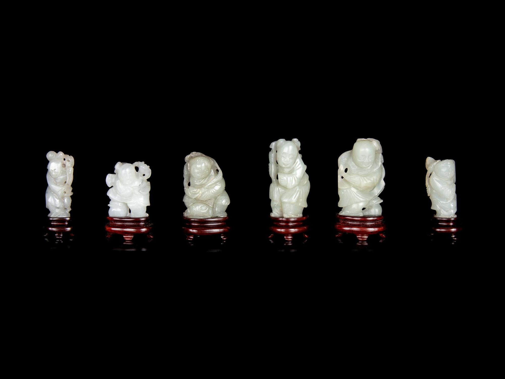 Six Chinese Carved Celadon Jade Figures of Boys