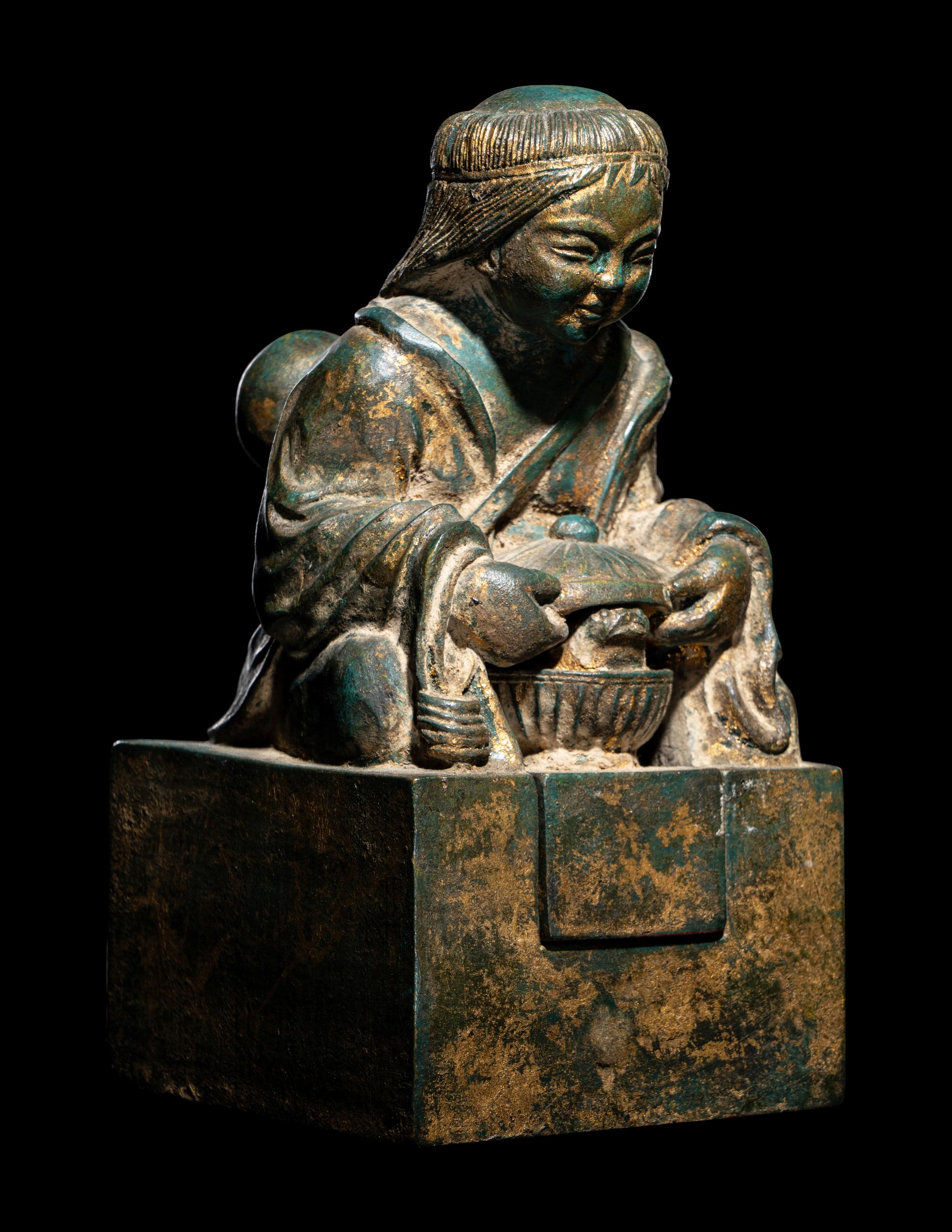 An Unusual Set of Two Parcel-Gilt Wood ' Liuhai and Toad' Seals