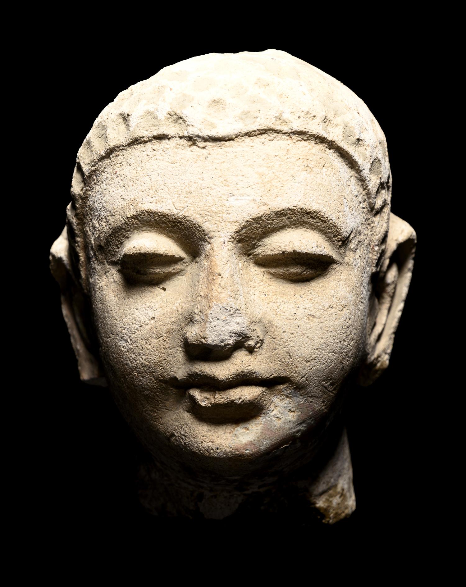 Four Gandharan Stucco Fragmented Heads