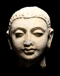 Four Gandharan Stucco Fragmented Heads