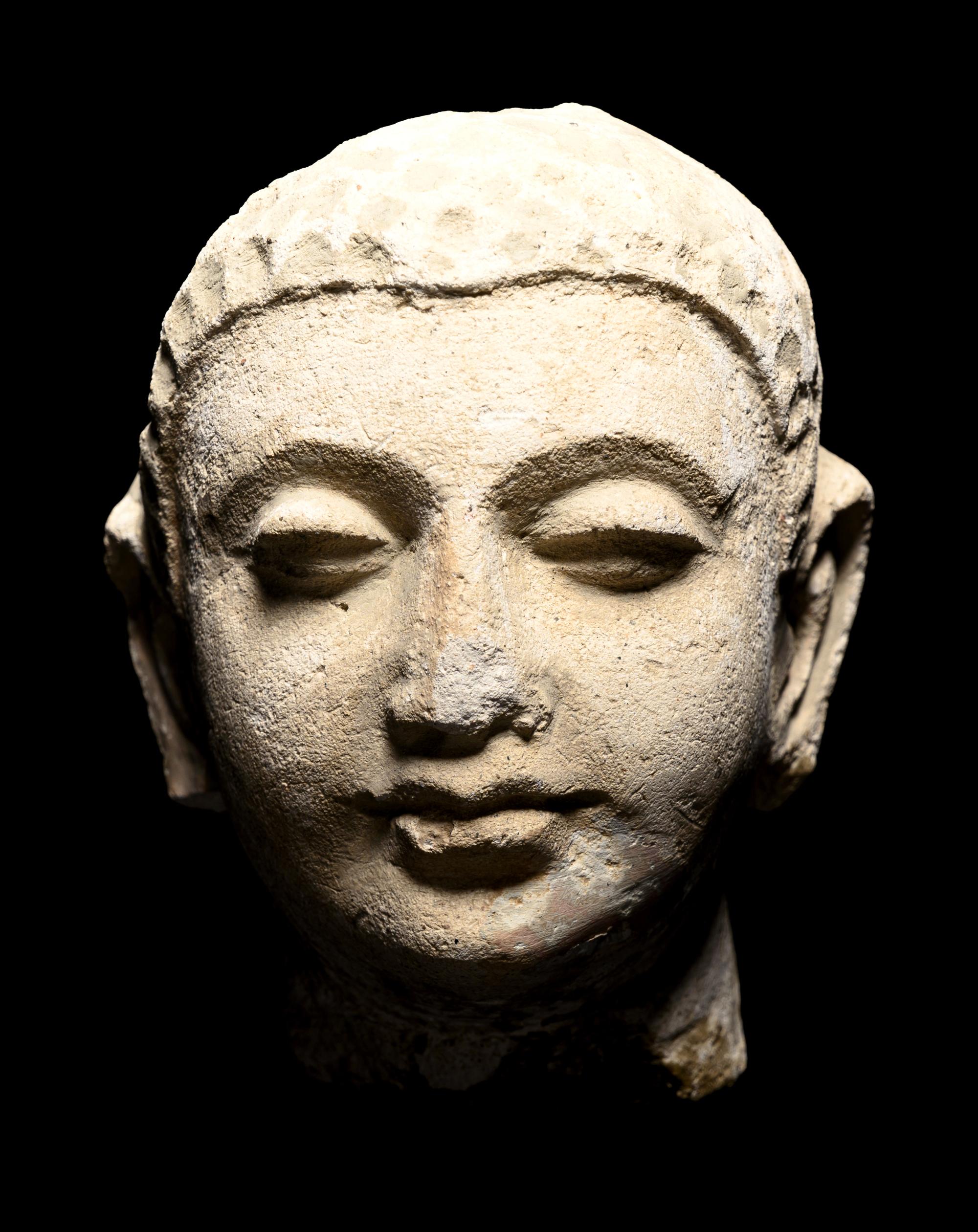 Four Gandharan Stucco Fragmented Heads