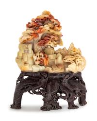 A Chinese Carved Soapstone Group