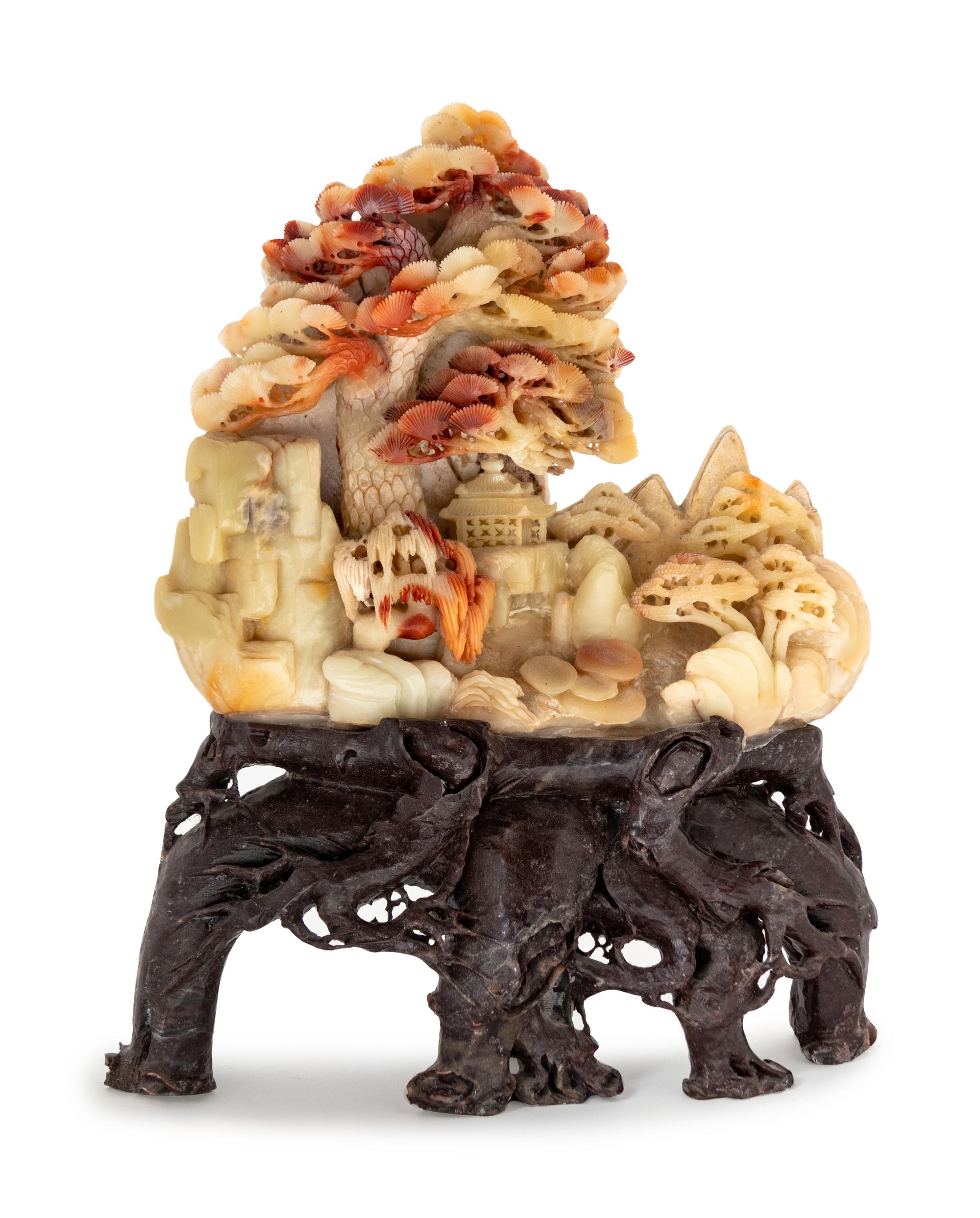 A Chinese Carved Soapstone Group