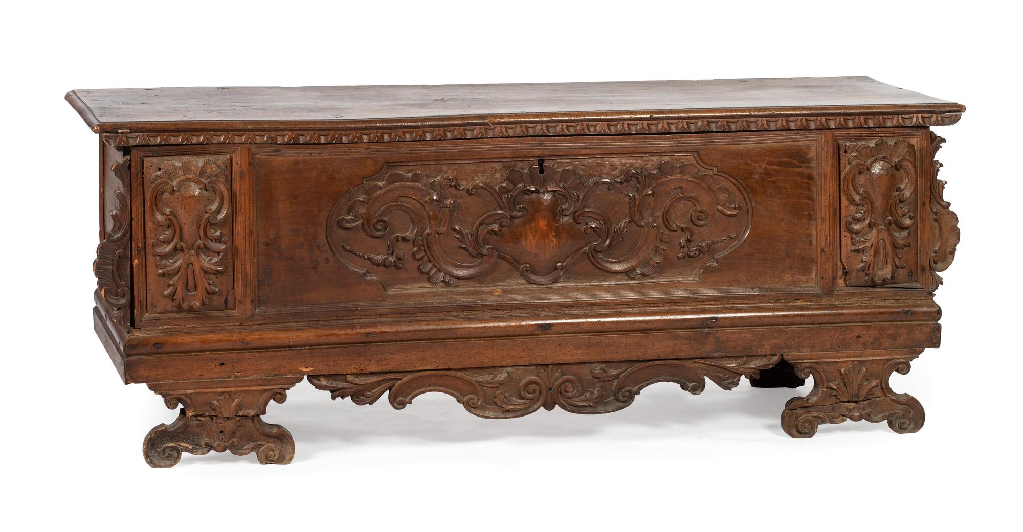An Italian Carved Walnut Cassone