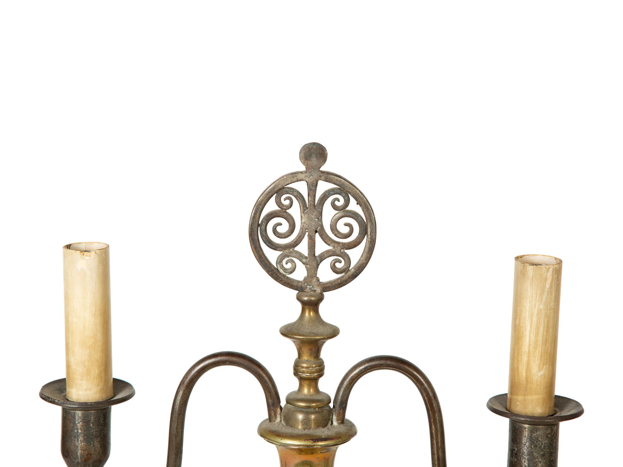 A Pair of Steel and Brass Candelabra Converted to Electricity