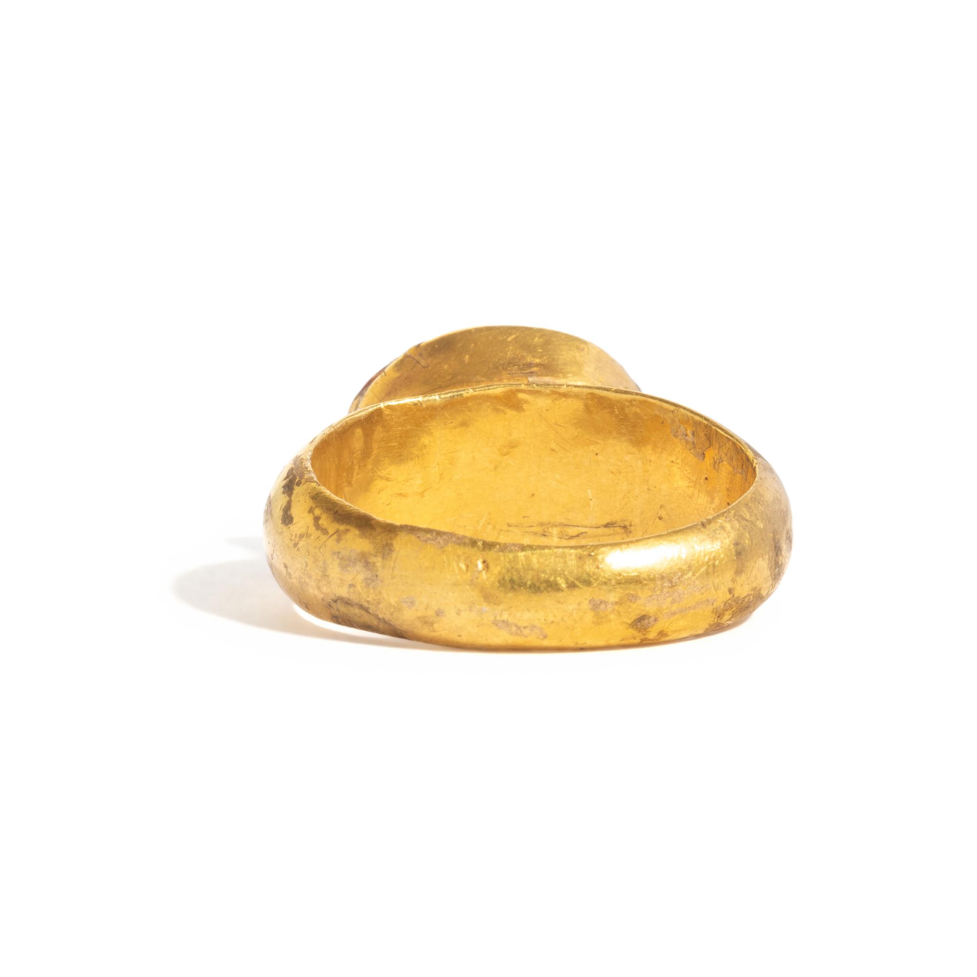 A Roman Gold and Carnelian Finger Ring with the Goddess Minerva