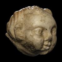 A Roman Marble Head of an Infant