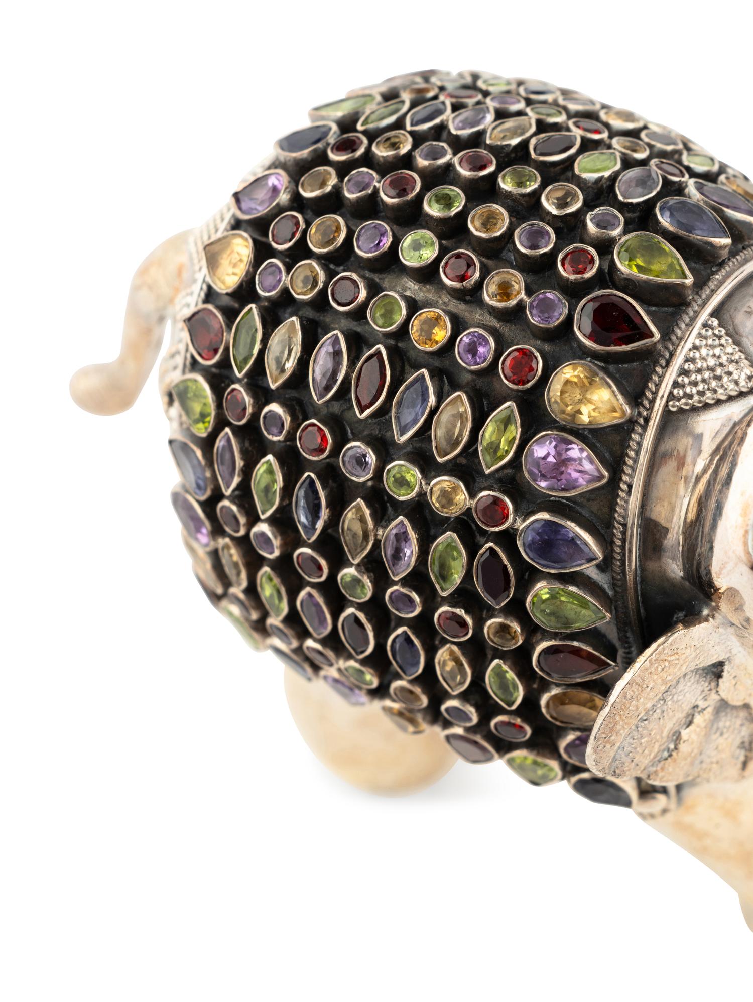 An East Indian Silver Plated and Jeweled Figure of an Elephant