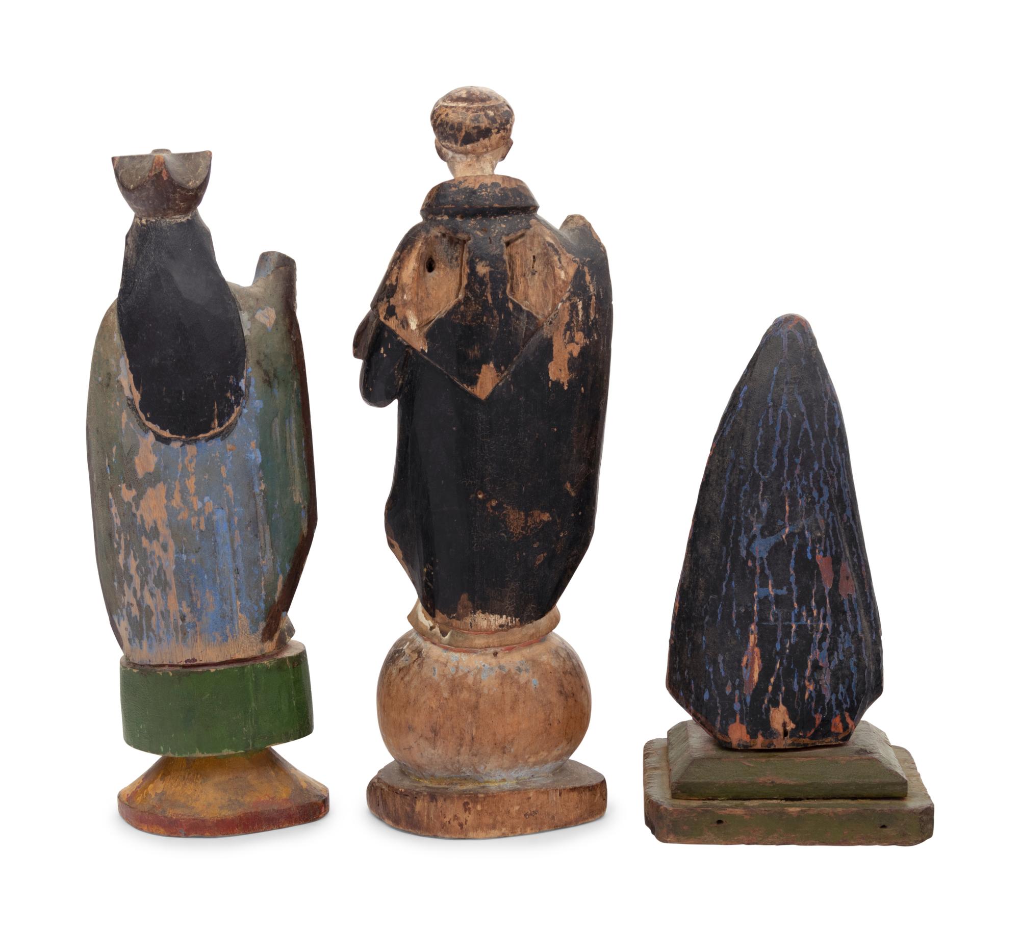 Three Carved and Polychrome Decorated Santos Figures