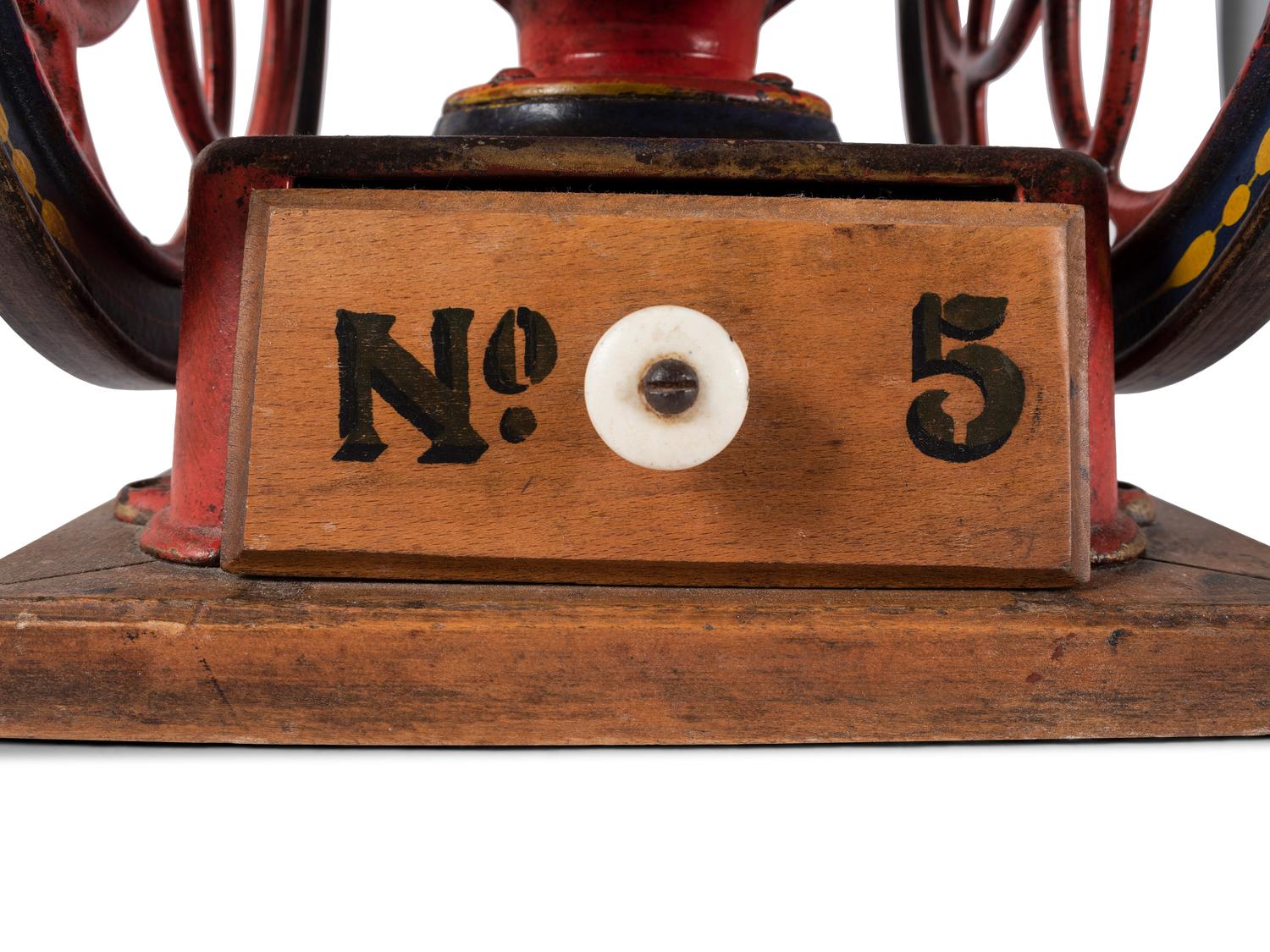 An Enterprise No. 5 Painted and Flag Decorated Cast Iron Coffee Mill