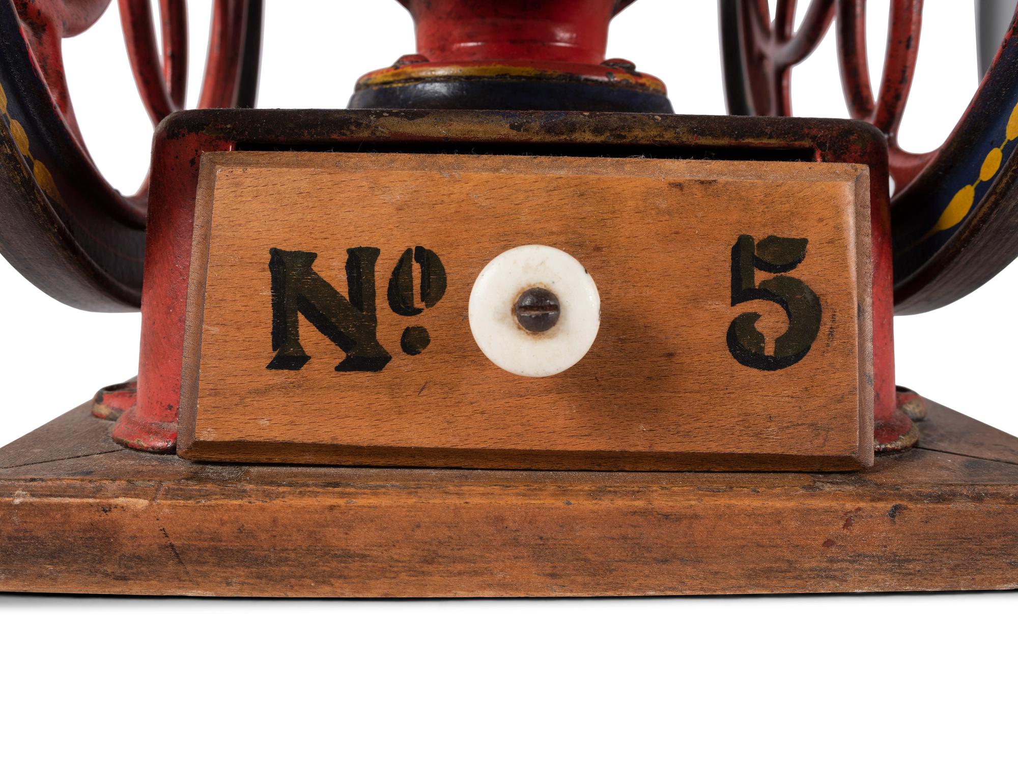An Enterprise No. 5 Painted and Flag Decorated Cast Iron Coffee Mill
