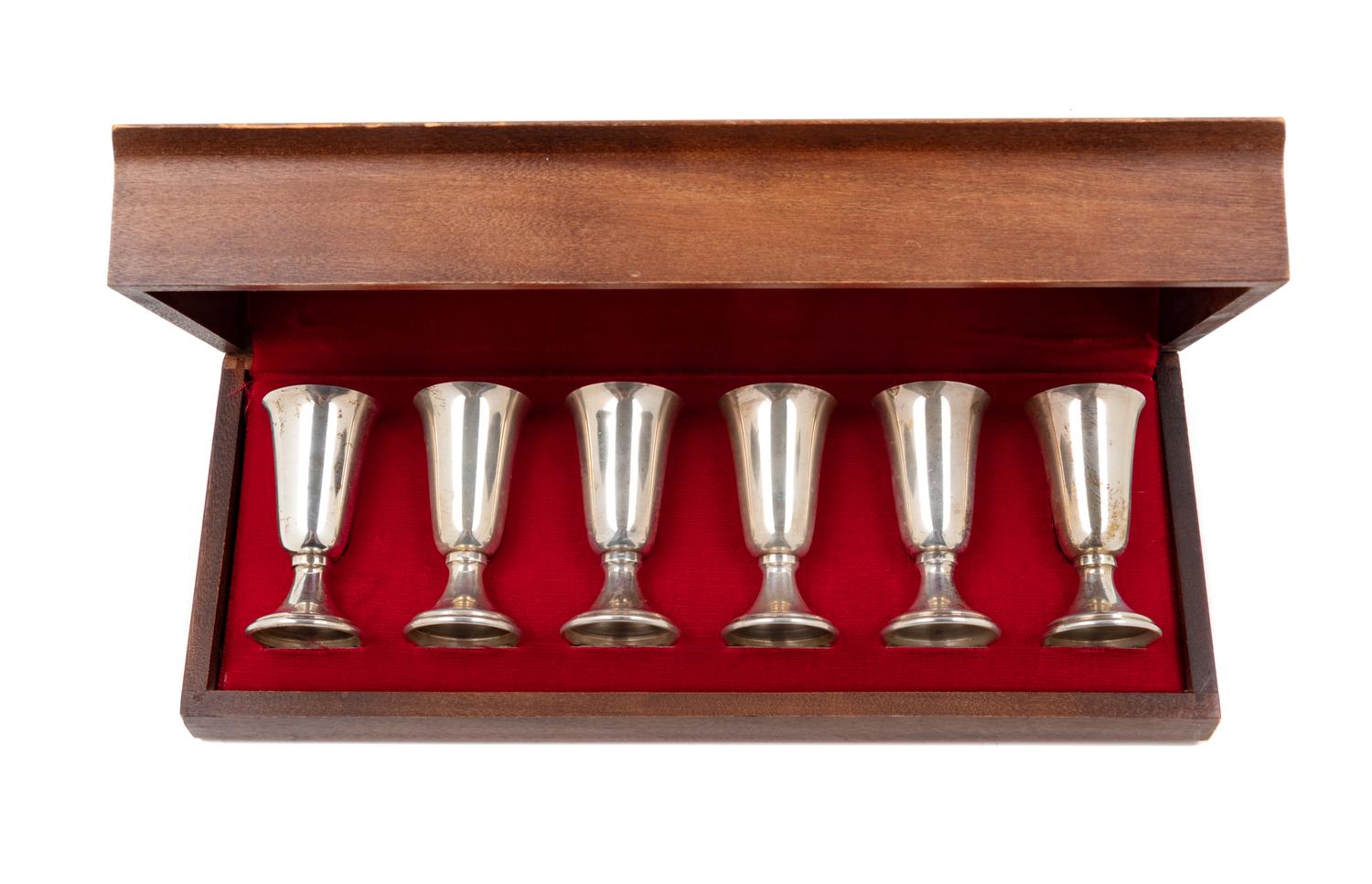 A Set of Six Cased Silver Cordials
