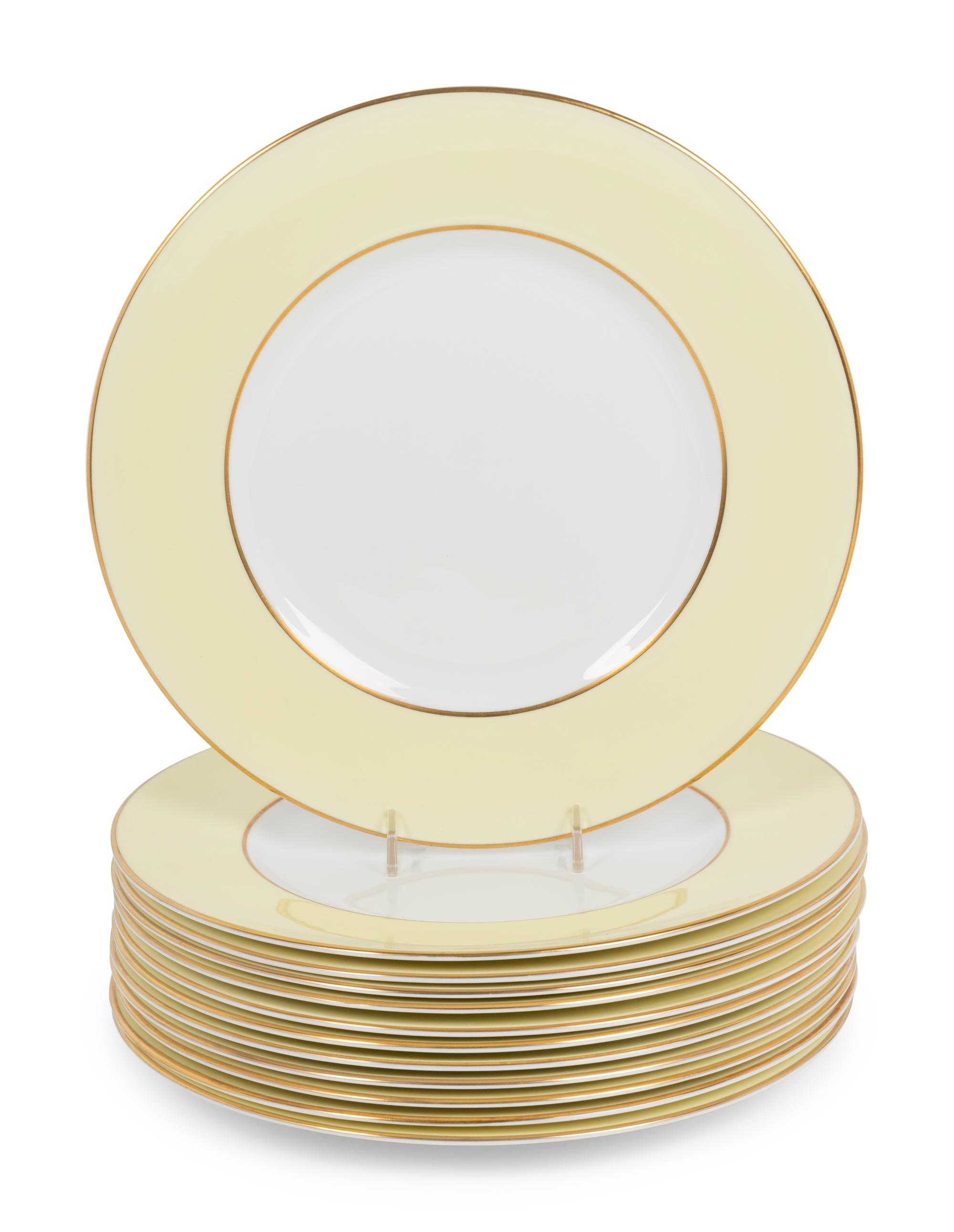 A Set of Twelve Royal Worcester Porcelain Chargers and Eleven Similar Wedgwood Porcelain Salad Plates