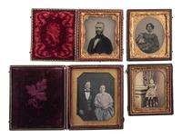 [EARLY PHOTOGRAPHY - PORTRAITURE]. A group of 21 assorted daguerreotypes, ambrotypes, tintypes, and CDVs of men, women, and children, with Kenosha, WI album with tintypes, CDVs, and cabinet cards.