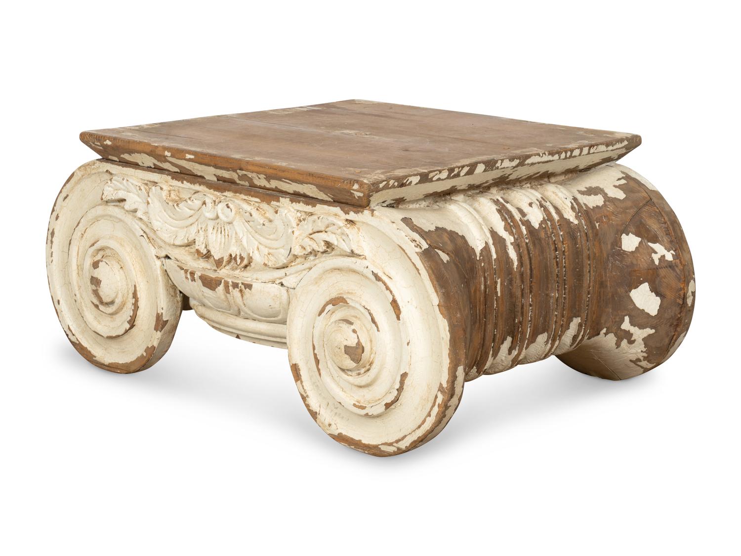 A Carved and Painted Pine Ionic Capital Low Table