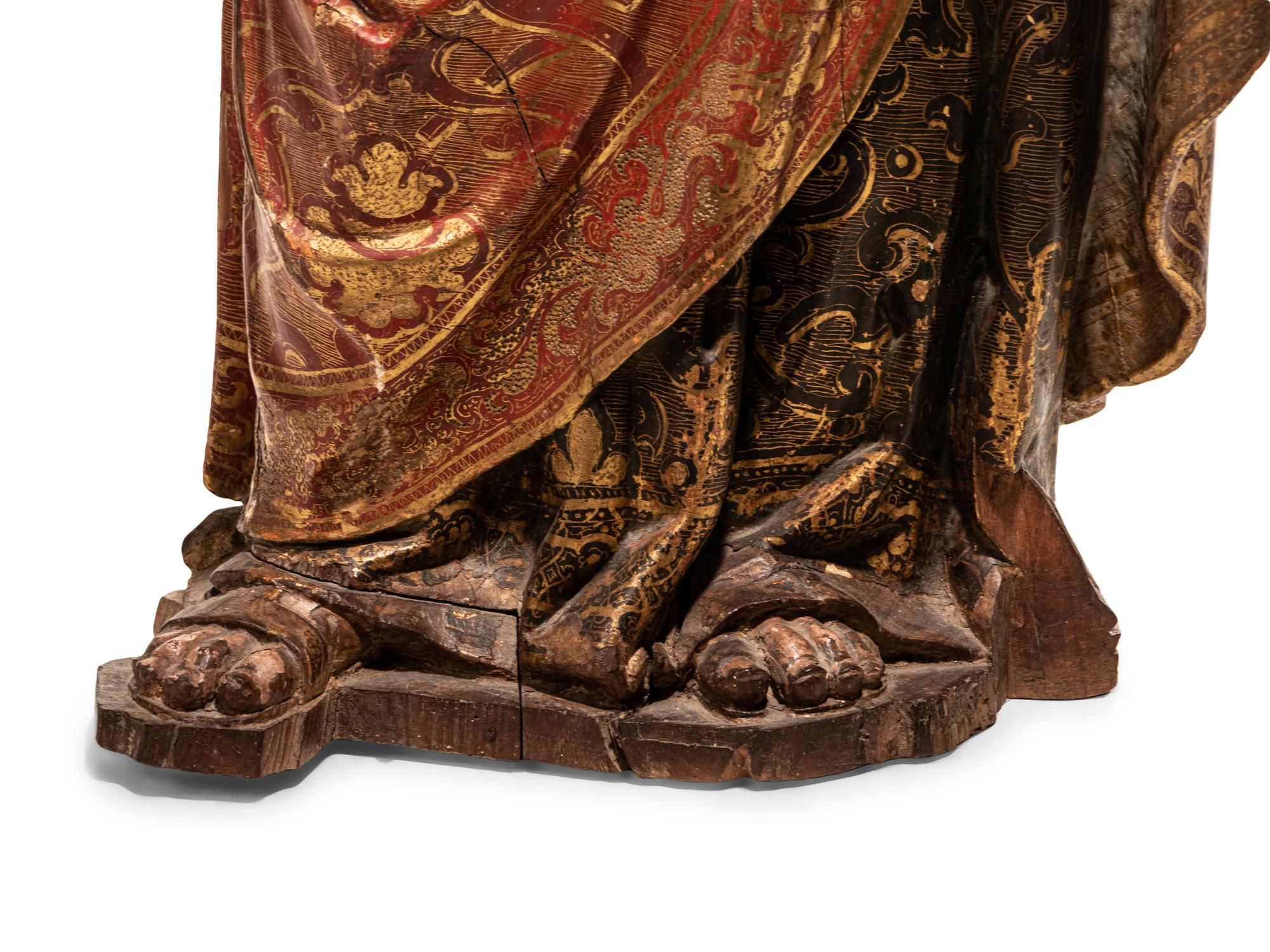 A Carved Parcel Gilt and Polychrome Decorated Figure of Santa Luzia