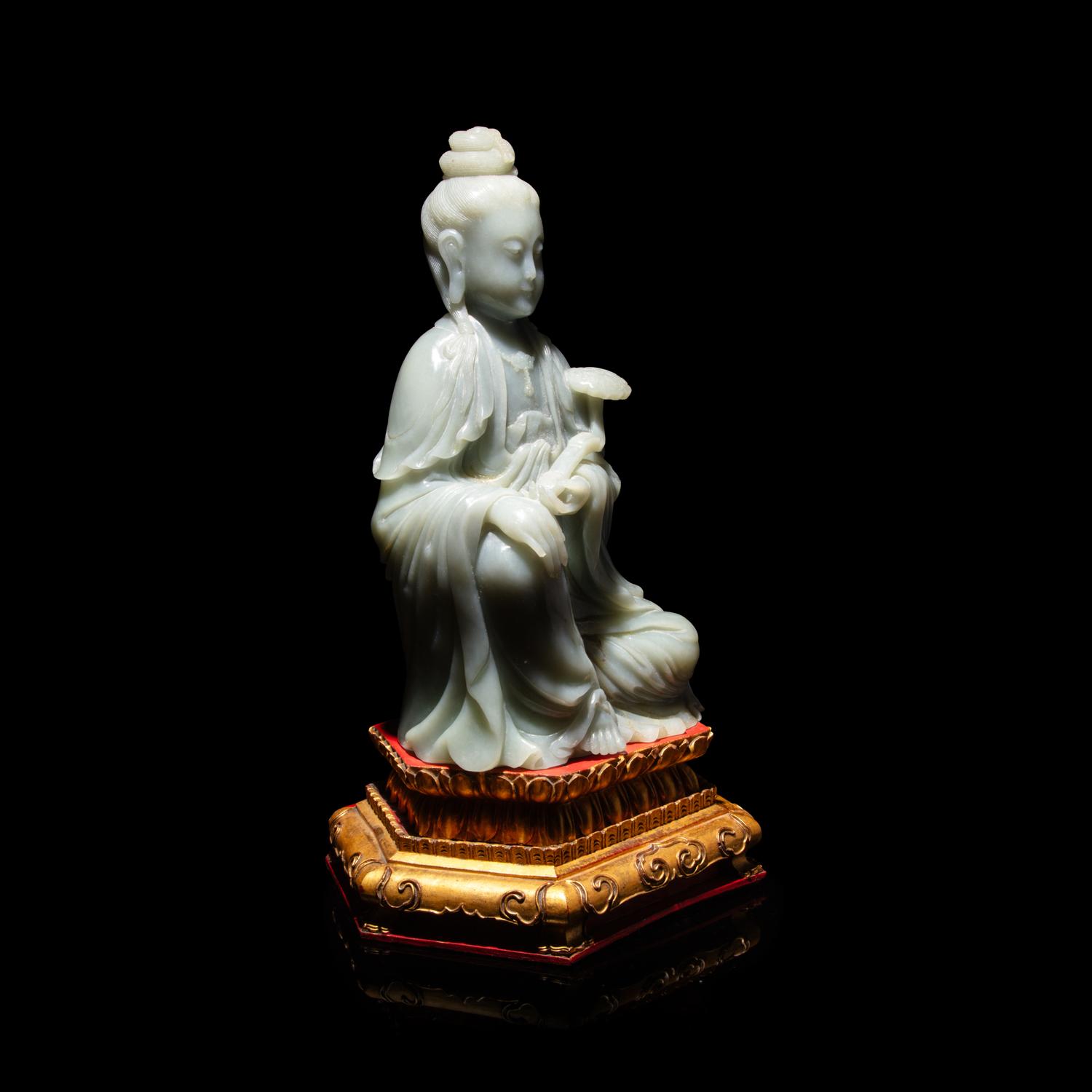 A Chinese Celadon Jade Seated Guanyin, 20th Century — 近代 青玉觀音坐像