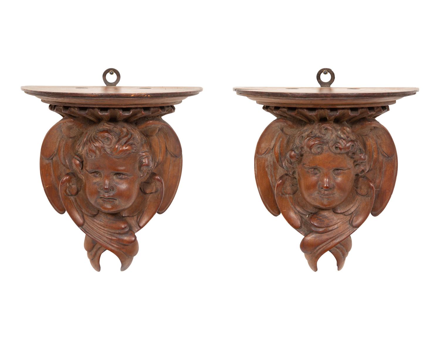 A Pair of English Carved Pear Wood Cherub Wall Brackets