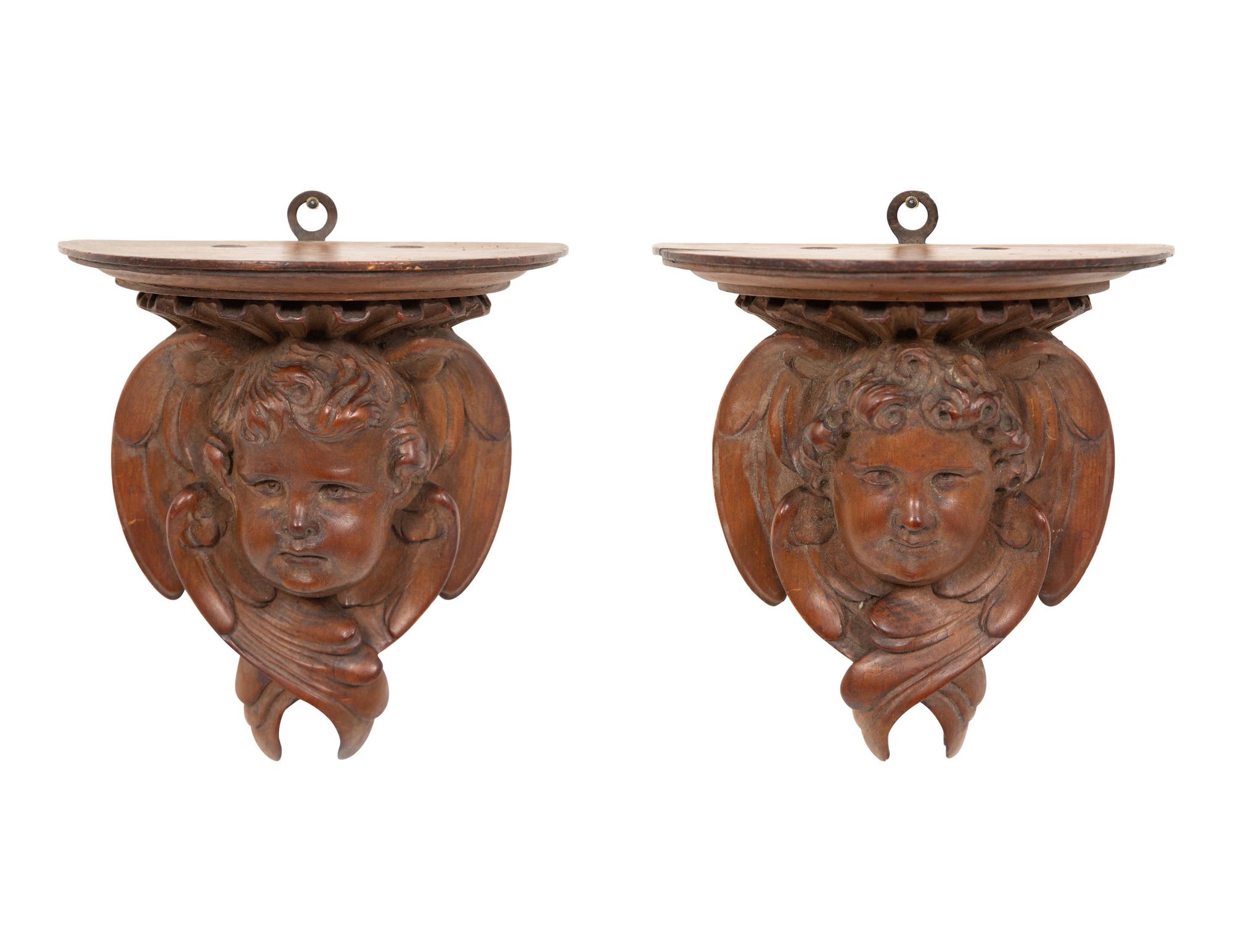 A Pair of English Carved Pear Wood Cherub Wall Brackets
