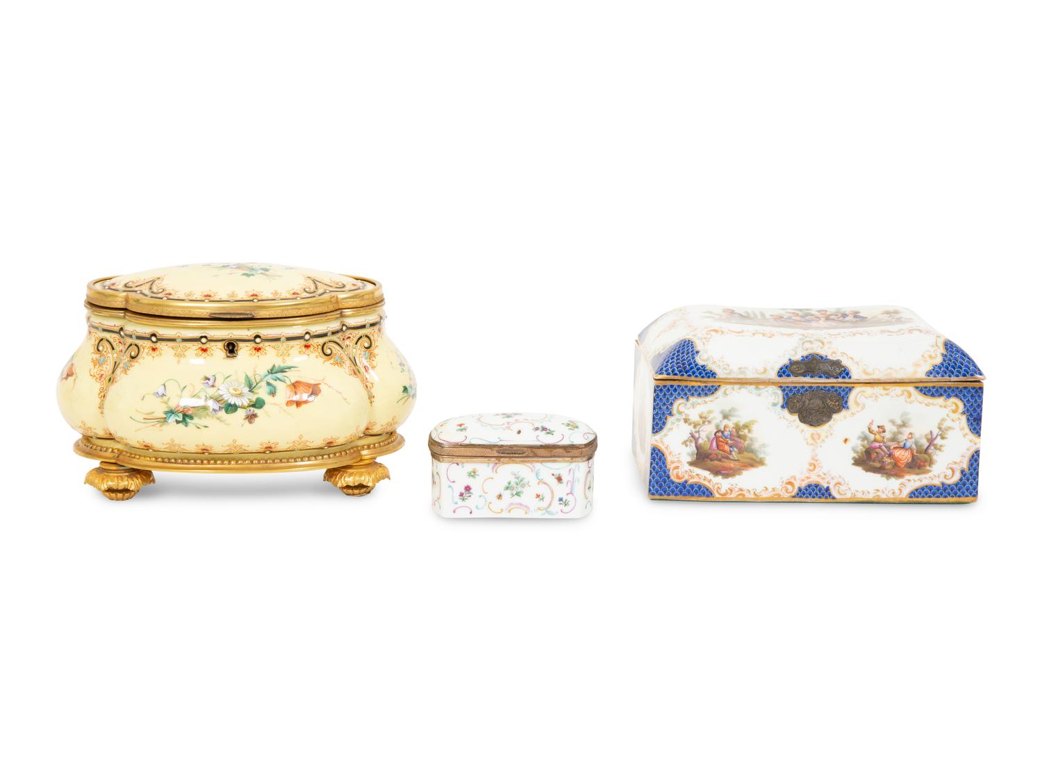 A Group of Three French Gilt Metal Mounted Porcelain Boxes