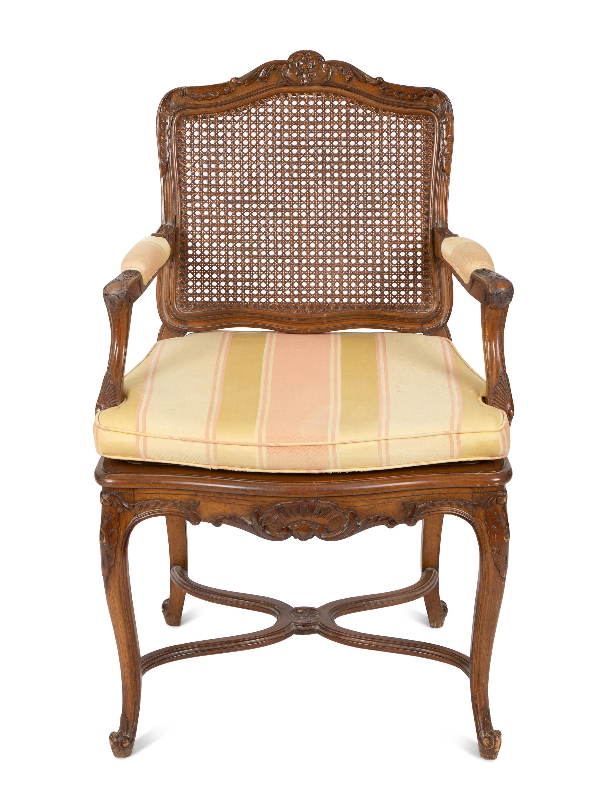 A Louis XV Style Carved Mahogany Cane Seat and Back Fauteuil — 20TH CENTURY