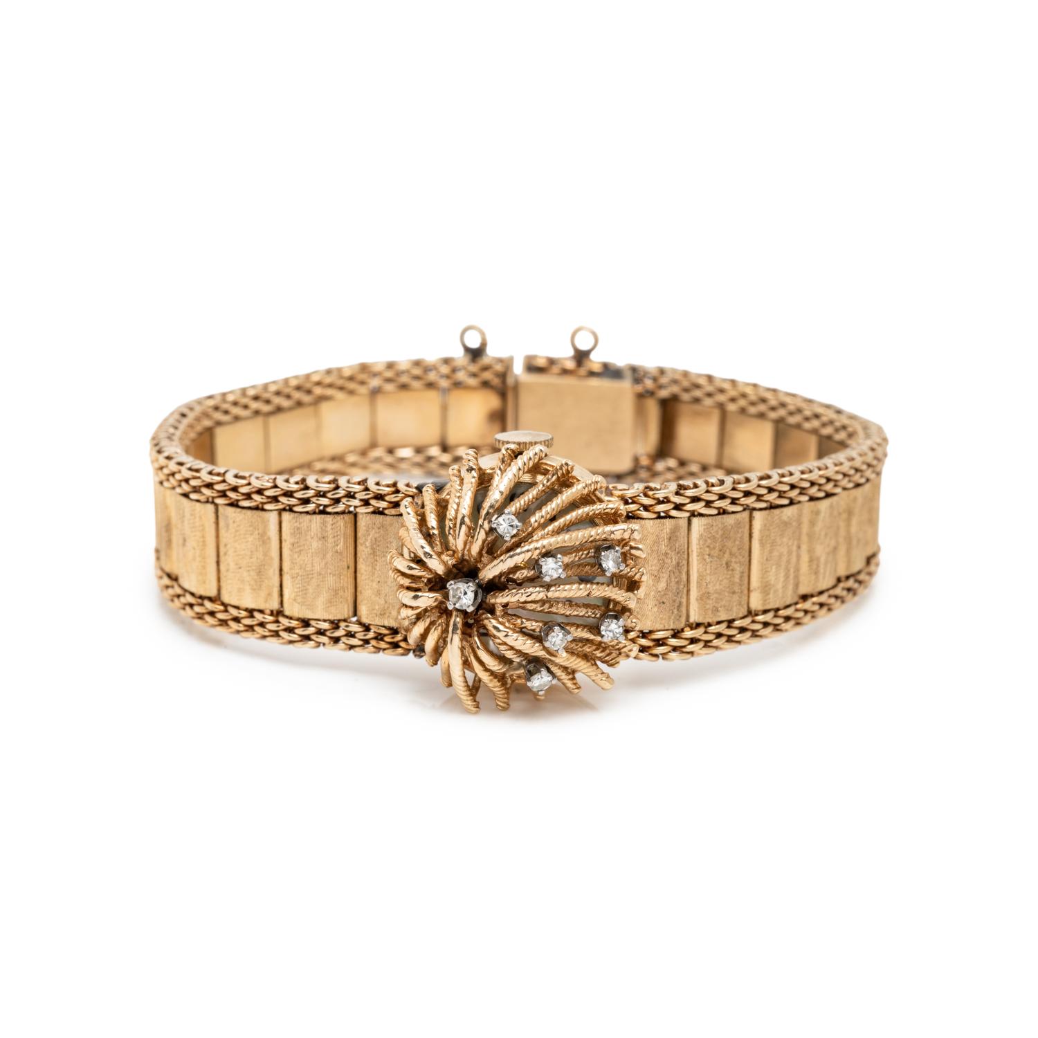 LUVA, 14K YELLOW GOLD AND DIAMOND SURPRISE WATCH