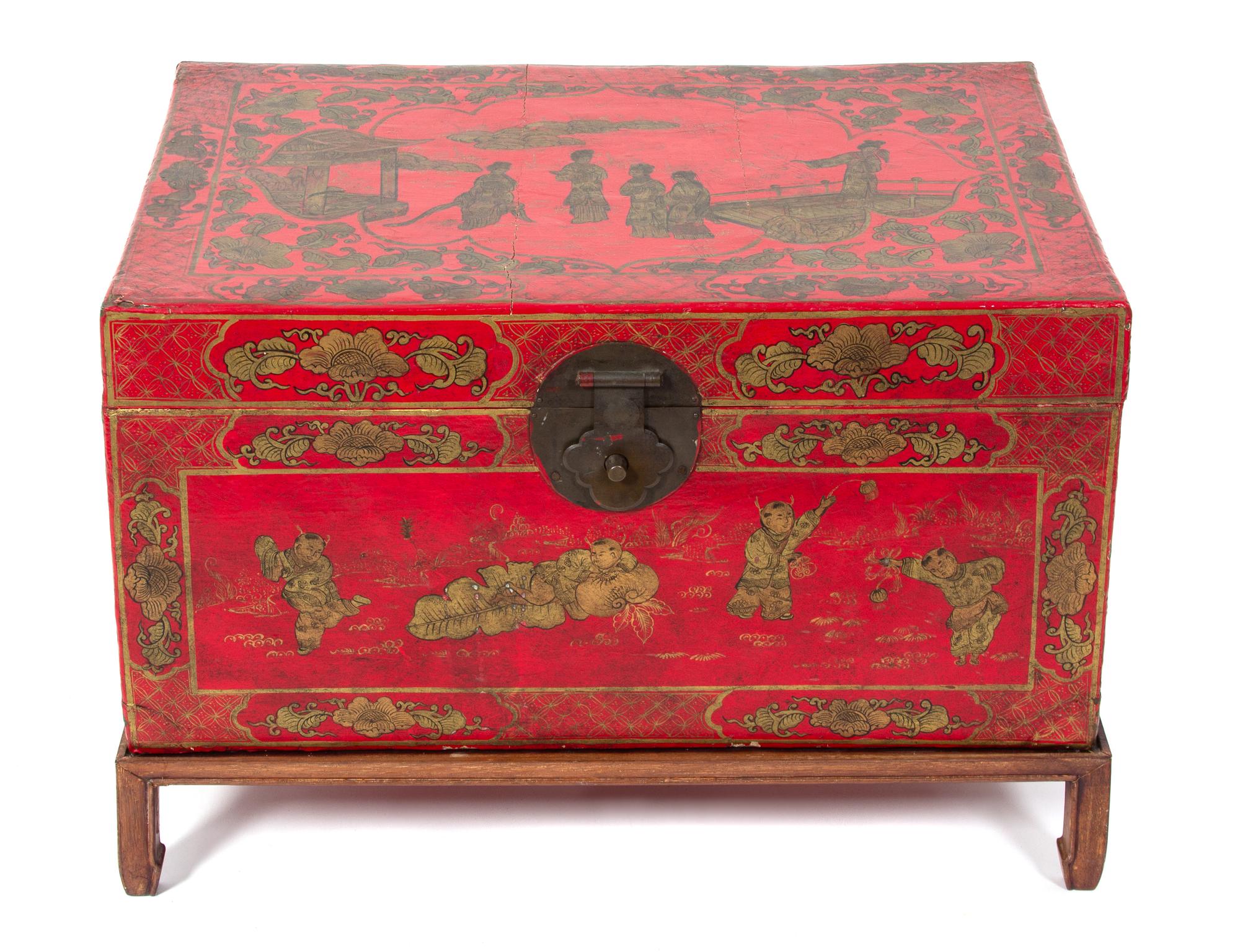 A Chinese Red and Gilt Lacquer Bride's Box Height 15 x width 29 x depth 20 1/2 inches.