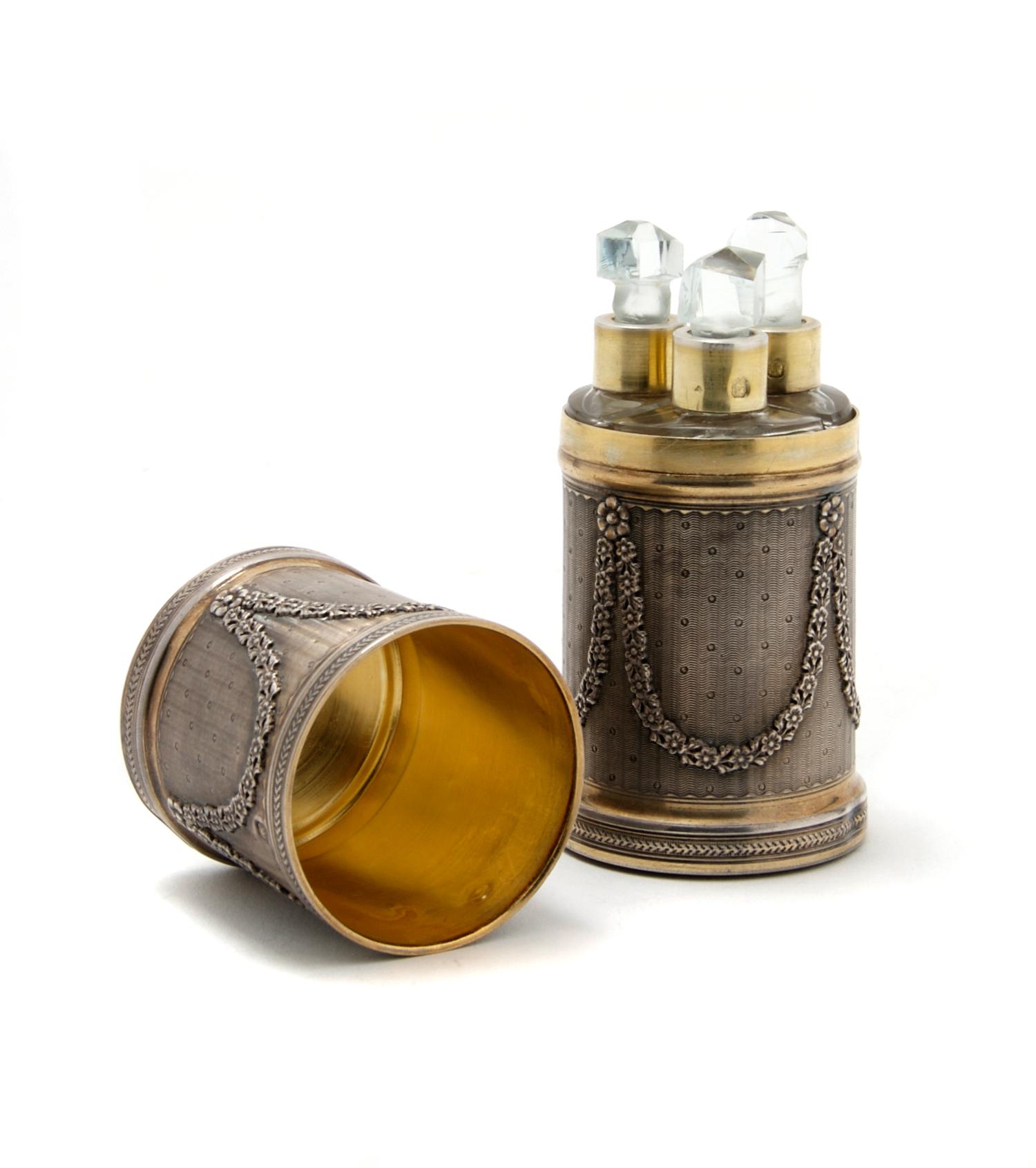 A French Neoclassical Silver and Glass Scent Bottle, Height 4 inches.