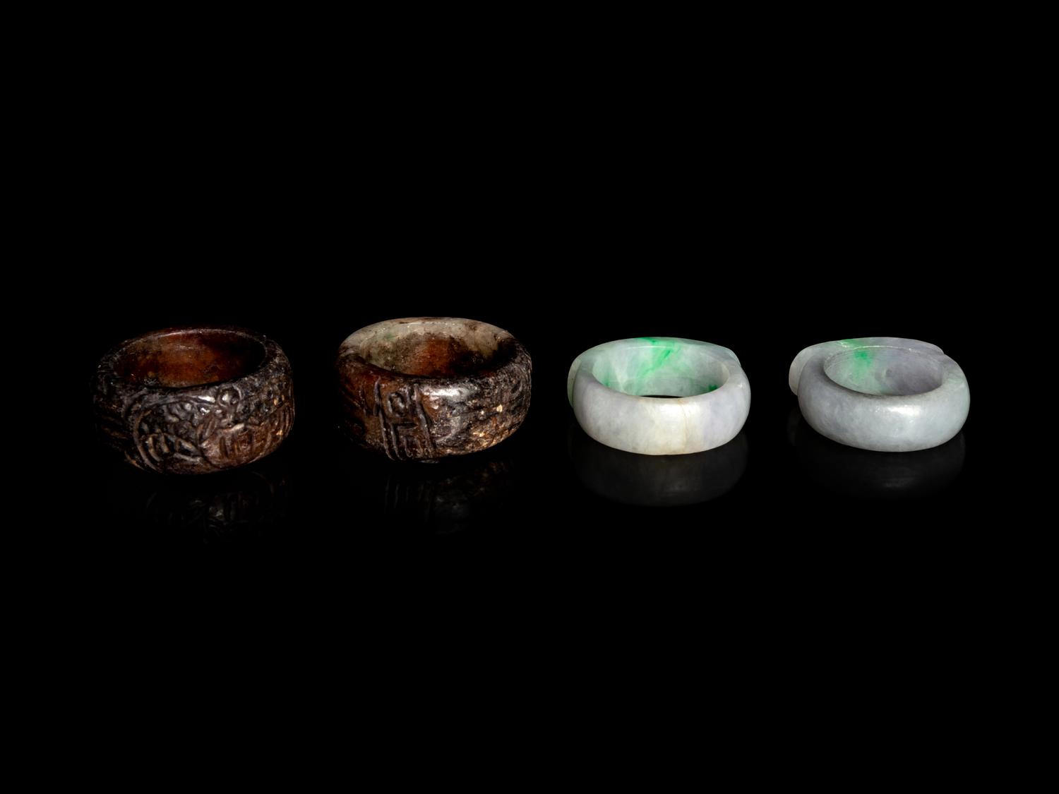 Two Chinese Jadeite Archer's Rings and A Pair of Chinese Hardstone Ring