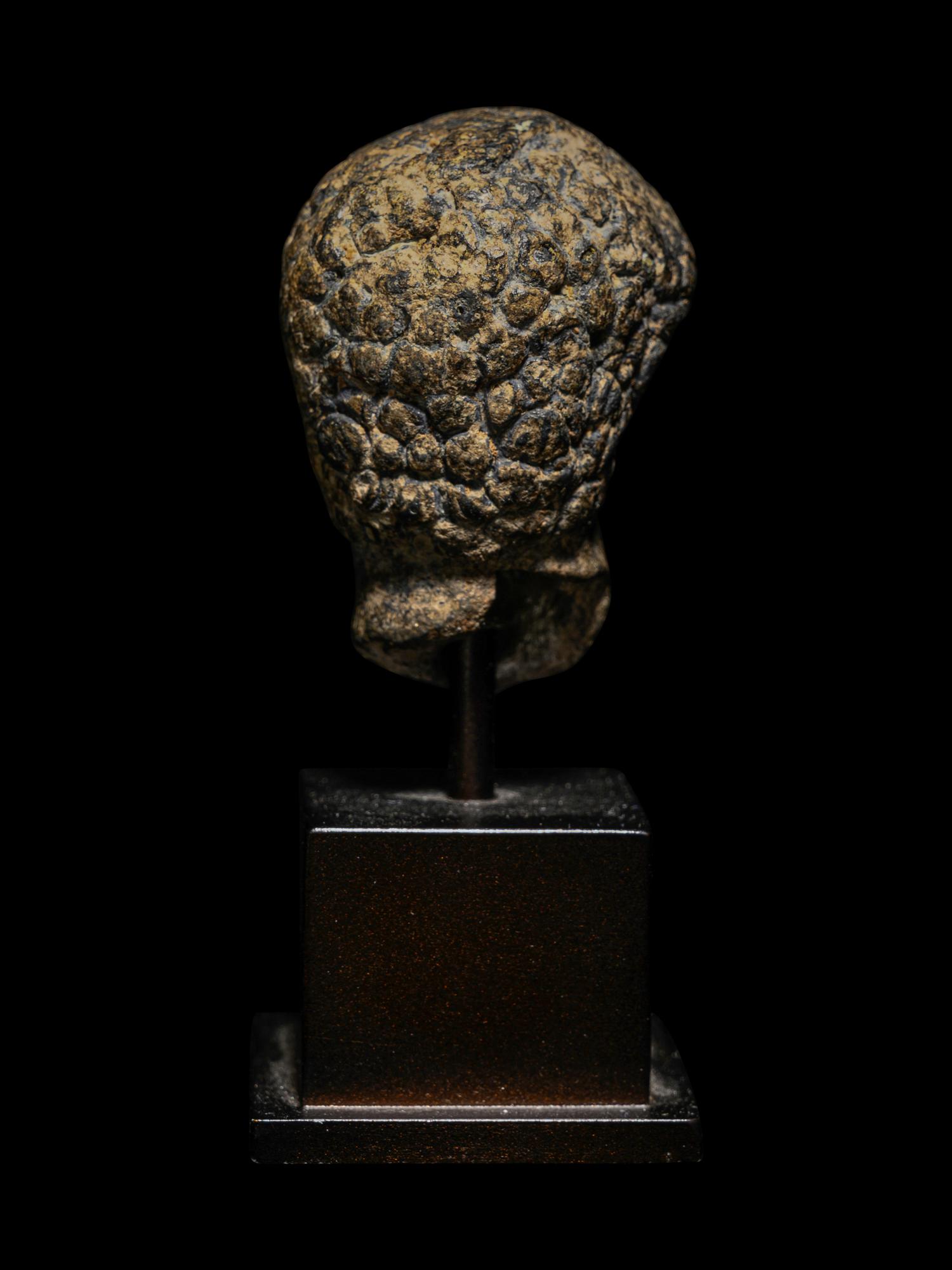A Roman Bronze Head of Apollo