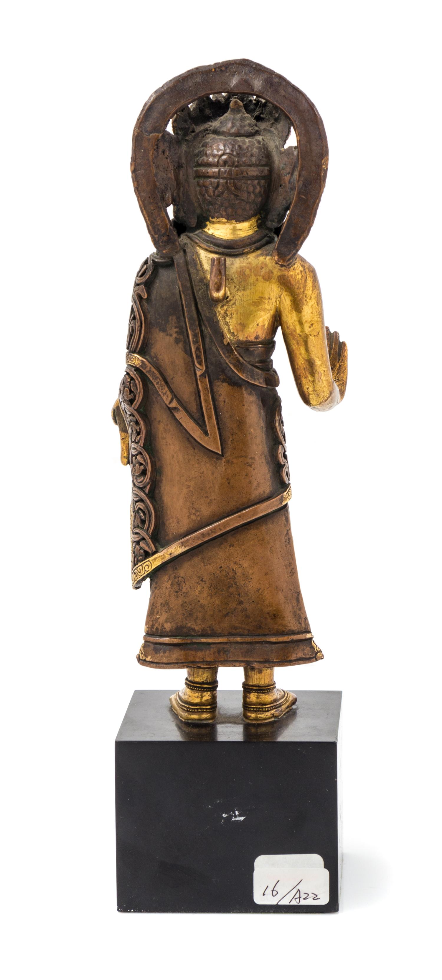 A Gilt Bronze Figure of a Standing Deity