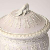 A Wedgwood Lilac Dip Jasperware "Shell and Arabesque" Vase and Cover UK, 1870s or 1880s
