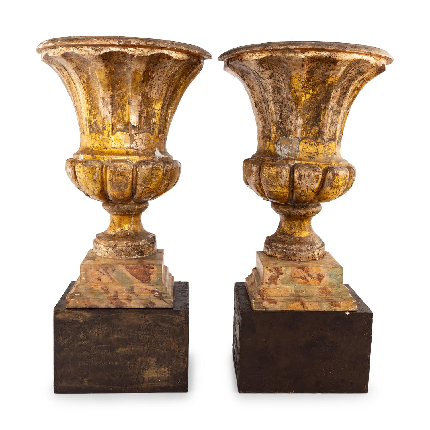 A Pair of Italian Giltwood Flat-Back Urns