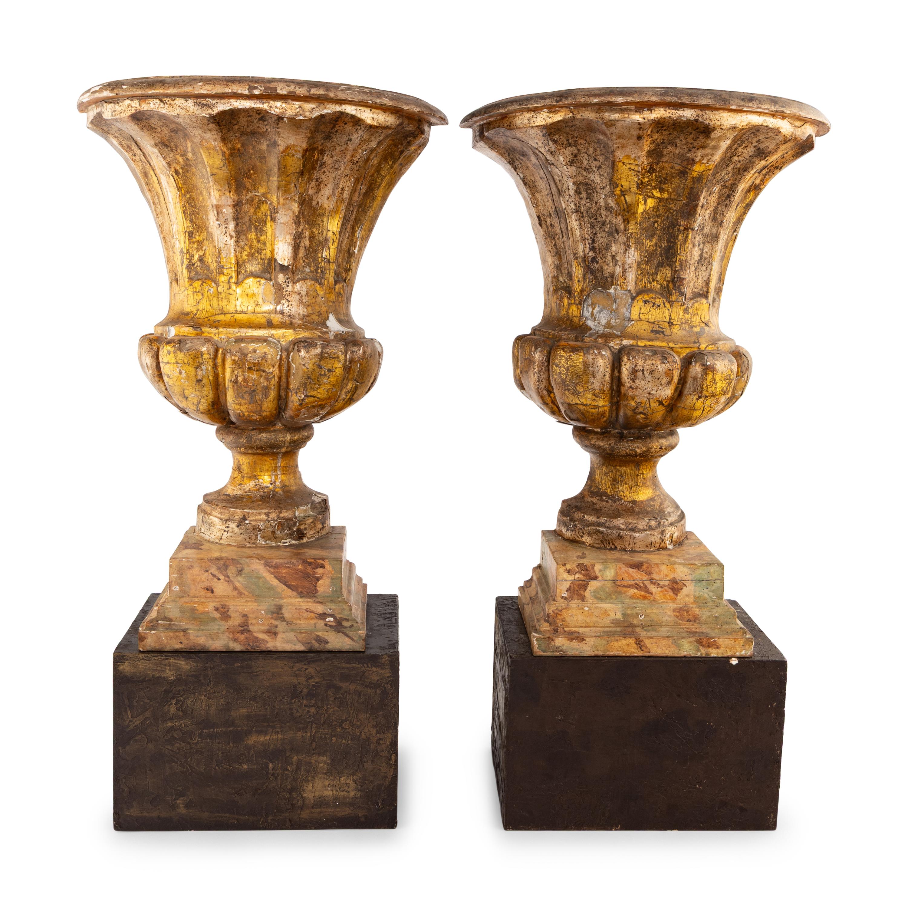 A Pair of Italian Giltwood Flat-Back Urns