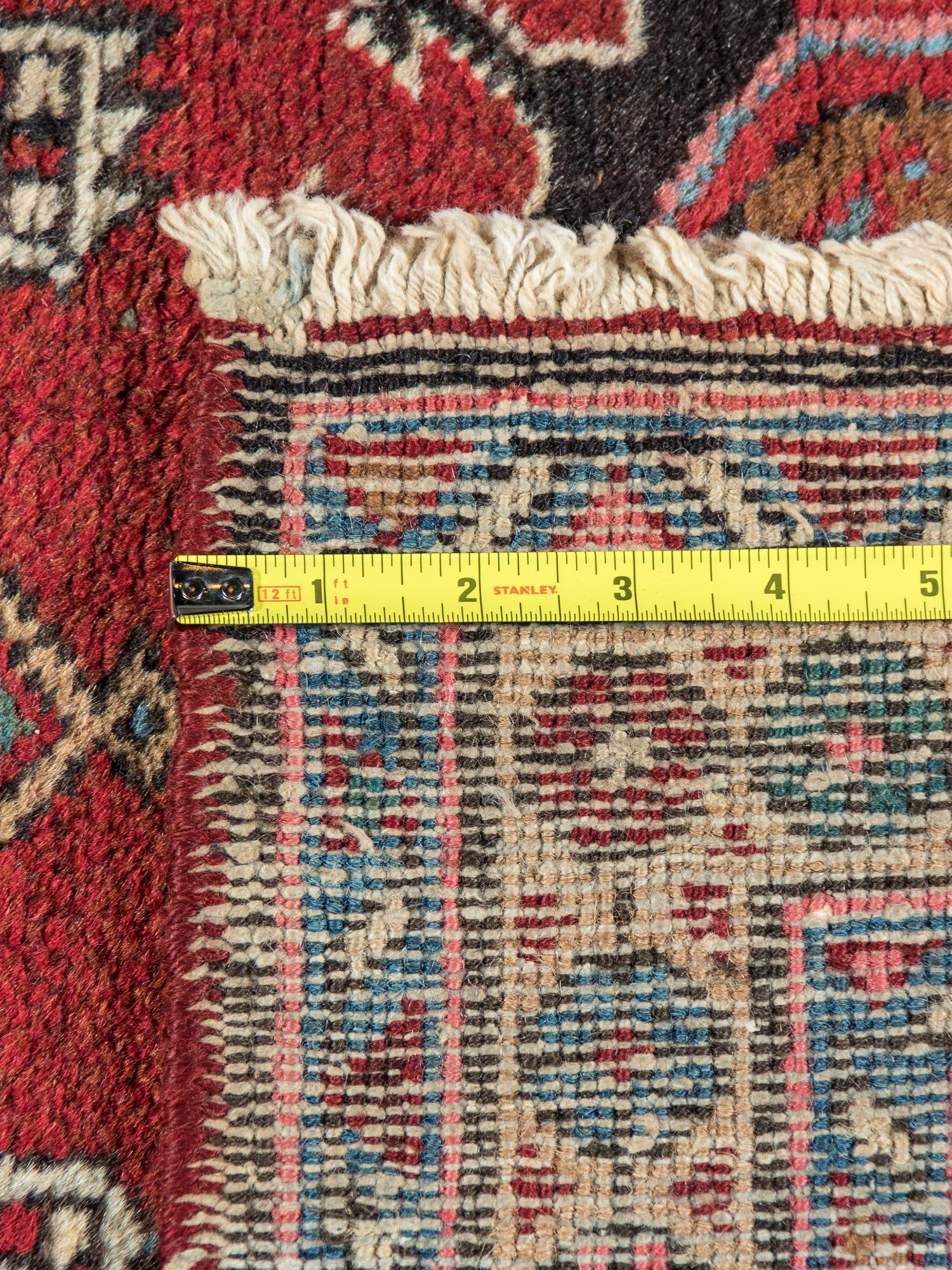Five Wool Rugs